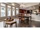 Cozy dining area with table, chairs, and a view of the kitchen through a partial wall at 7743 Camelback Dr, Indianapolis, IN 46250