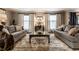 Comfortable living room with stylish furnishings, hardwood floors, and neutral tones at 7743 Camelback Dr, Indianapolis, IN 46250