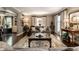 Comfortable living room with stylish furnishings, hardwood floors, and neutral tones at 7743 Camelback Dr, Indianapolis, IN 46250
