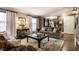 Comfortable living room with stylish furnishings, hardwood floors, and neutral tones at 7743 Camelback Dr, Indianapolis, IN 46250