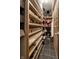 Walk-in pantry with custom shelving, providing ample storage space at 7743 Camelback Dr, Indianapolis, IN 46250