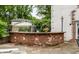 Brick wet bar great for entertaining in the outdoor patio at 7743 Camelback Dr, Indianapolis, IN 46250
