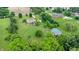 An aerial view shows a well maintained home with large yard and outbuilding at 8818 Mathews Rd, Indianapolis, IN 46259