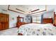 This main bedroom has trey ceilings and an ocean themed bedspread at 8818 Mathews Rd, Indianapolis, IN 46259