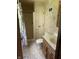 Functional bathroom with a shower, toilet, vanity, and floral shower curtain at 8875 N Goat Hollow Rd, Mooresville, IN 46158