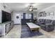Living room with ceiling fan, TV, and two couches at 911 Centennial Rd, Martinsville, IN 46151