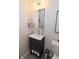 The bathroom features gray cabinets, a white vessel sink, and a framed mirror at 9477 Aberdare N Dr, Indianapolis, IN 46250