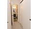 This bathroom has a vanity with a mirror and lighting, toilet, and linen closet at 9477 Aberdare N Dr, Indianapolis, IN 46250