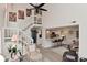 Bright open-concept living area with a staircase and views of the kitchen at 9477 Aberdare N Dr, Indianapolis, IN 46250