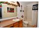 Cozy bathroom featuring a vanity and a shower tub combination, and decorative elements for a touch of style at 10601 Adam Dr, Indianapolis, IN 46231
