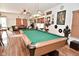 Stylish game room featuring a pool table, piano, and unique decor for entertainment at 10601 Adam Dr, Indianapolis, IN 46231