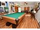 Large entertainment room with pool table, piano, and unique decorative elements creating a fun space at 10601 Adam Dr, Indianapolis, IN 46231
