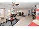 Neutral living room with a decorative coffee table and carpet, complemented by bright windows at 10601 Adam Dr, Indianapolis, IN 46231