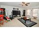 Neutral living room with a large TV, patterned rugs, and plenty of space for furniture at 10601 Adam Dr, Indianapolis, IN 46231
