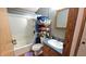 A clean bathroom with a vanity, toilet, and shower provides a functional and private space at 10694 W Hickory Ct, Quincy, IN 47456