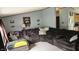 Comfortable living room featuring a large sectional and cozy atmosphere at 10694 W Hickory Ct, Quincy, IN 47456