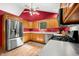 Modern kitchen boasting stainless steel appliances, custom cabinets, and contemporary finishes throughout at 11059 W Old Nashville Rd, Columbus, IN 47201