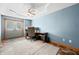 Well-lit office features blue walls, an exterior door, and a spacious work area at 11059 W Old Nashville Rd, Columbus, IN 47201