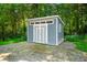 New shed with double doors and transom windows for extra storage or workshop space at 11059 W Old Nashville Rd, Columbus, IN 47201