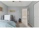 This bedroom features neutral walls, carpet, and plenty of space for a desk at 11532 Glenn Abbey Ln, Indianapolis, IN 46235