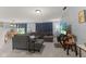 Cozy living room featuring a large sectional sofa, contemporary decor, and a relaxing atmosphere at 11532 Glenn Abbey Ln, Indianapolis, IN 46235