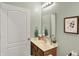 Charming bathroom features a decorative mirror, attractive vanity and fixtures at 1163 Meadowlark Dr, Greenwood, IN 46143
