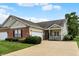 Charming home with brick and vinyl siding, manicured lawn, and a two car garage at 1163 Meadowlark Dr, Greenwood, IN 46143