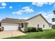 Charming single-story home with a well-manicured lawn, attached garage, and neutral siding at 1163 Meadowlark Dr, Greenwood, IN 46143