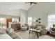 Open living room featuring hardwood floors, neutral paint and an open concept layout to the kitchen at 1163 Meadowlark Dr, Greenwood, IN 46143