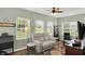 Inviting living room with neutral colors, plush seating, and natural light streaming through the windows at 1163 Meadowlark Dr, Greenwood, IN 46143