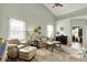 Bright living room featuring vaulted ceilings, hardwood floors, and comfortable seating arrangement at 1163 Meadowlark Dr, Greenwood, IN 46143