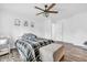Bedroom features a ceiling fan, natural light, and neutral colored walls at 1181 S Aberdeen Dr, Franklin, IN 46131