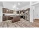 Spacious kitchen with stainless steel appliances, a center island, and ample counter space at 1181 S Aberdeen Dr, Franklin, IN 46131