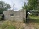 Damaged stone structure in the backyard at 1214 Wallace Ave, Indianapolis, IN 46201