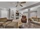 Inviting finished basement featuring built-in shelving, a recliner and seating at 12234 Limestone Dr, Fishers, IN 46037