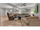 Spacious basement living area with comfortable seating and hardwood floors at 12234 Limestone Dr, Fishers, IN 46037