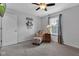 Comfortable bedroom with a patterned chair and ottoman at 12234 Limestone Dr, Fishers, IN 46037