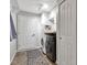 Well-lit laundry room with washer, dryer, cabinets, and convenient storage space at 12234 Limestone Dr, Fishers, IN 46037