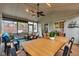 Covered porch with multiple seating areas and room for dining at 12234 Limestone Dr, Fishers, IN 46037