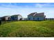 Spacious backyard with healthy green lawn and black metal fence at 1328 Plover Dr, Greenwood, IN 46143
