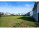 Spacious backyard with healthy green lawn and black metal fence at 1328 Plover Dr, Greenwood, IN 46143