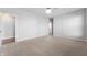 Bright bedroom with plush carpet, neutral walls, a ceiling fan with light fixture, and ample open space at 1328 Plover Dr, Greenwood, IN 46143