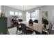 Inviting dining room featuring stylish decor and ample natural light from three well-placed windows at 1328 Plover Dr, Greenwood, IN 46143
