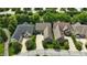 Aerial shot of the homes showing manicured lawns and tree-lined streets, with the neighborhood layout at 15410 Mission Hills Dr, Carmel, IN 46033