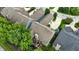 Aerial view features a residential property with a well-maintained deck and backyard at 15410 Mission Hills Dr, Carmel, IN 46033