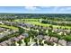 Panoramic aerial view of the golf course community, showcasing scenic views of the golf course and homes at 15410 Mission Hills Dr, Carmel, IN 46033