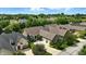 Beautiful aerial view of the neighborhood, showcasing lush green trees and well-maintained homes at 15410 Mission Hills Dr, Carmel, IN 46033