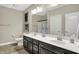 Bathroom features a double sink vanity with framed mirror at 15410 Mission Hills Dr, Carmel, IN 46033