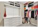 Organized walk-in closet with shelving, drawers, and hanging space maximizing storage at 15410 Mission Hills Dr, Carmel, IN 46033