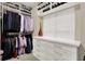 Organized walk-in closet with shelving, drawers, and hanging space maximizing storage at 15410 Mission Hills Dr, Carmel, IN 46033